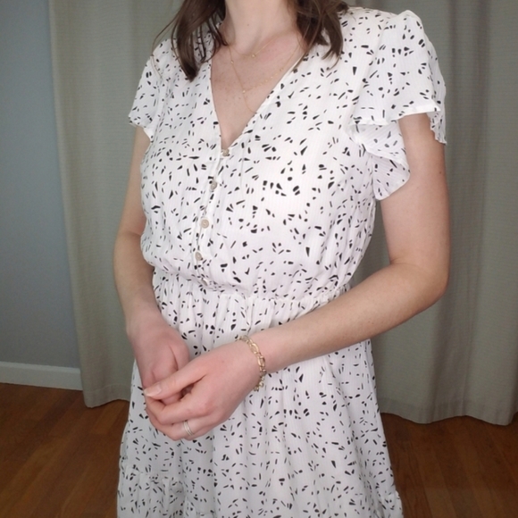 Main Strip Dresses & Skirts - Black and White Ruffle Sleeve Dress